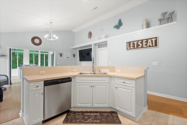 3486 Ashwycke St, Mount Pleasant, SC 29466 - kitchen with dishwasher, vaulted ceiling, white cabinetry, light countertops, and a chandelier