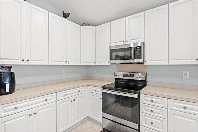 3486 Ashwycke St, Mount Pleasant, SC 29466 - kitchen featuring appliances with stainless steel finishes, light countertops, and white cabinets