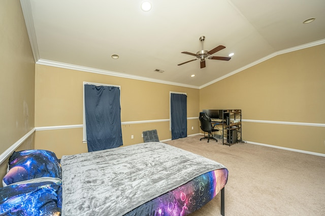 carpeted bedroom with ceiling fan, crown molding, and vaulted ceiling