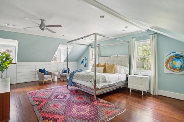 bedroom with crown molding, vaulted ceiling, dark hardwood / wood-style floors, and ceiling fan