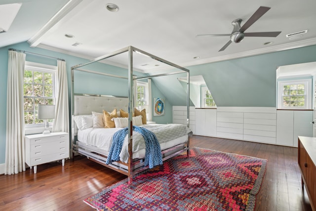 bedroom with ceiling fan, ornamental molding, dark hardwood / wood-style floors, and vaulted ceiling with beams