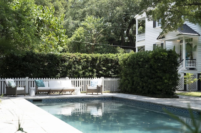 view of swimming pool featuring a patio