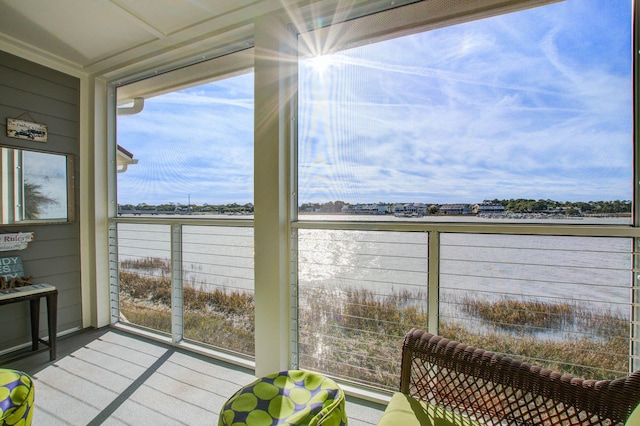 sunroom / solarium featuring a healthy amount of sunlight