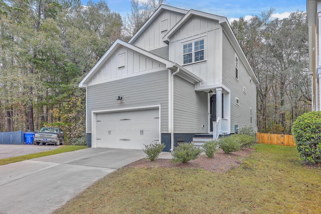 view of front facade featuring a garage and a front lawn