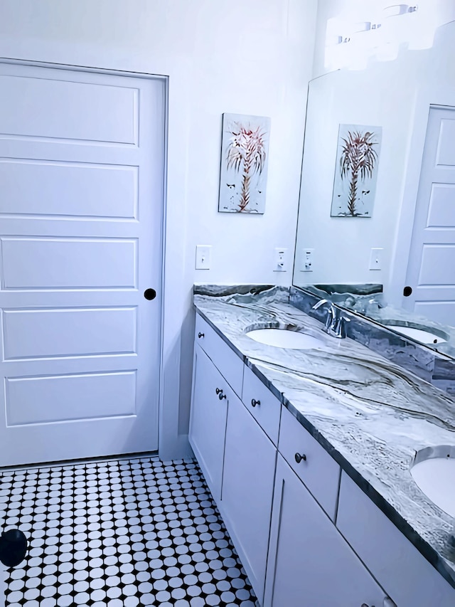 bathroom with vanity and tile patterned floors