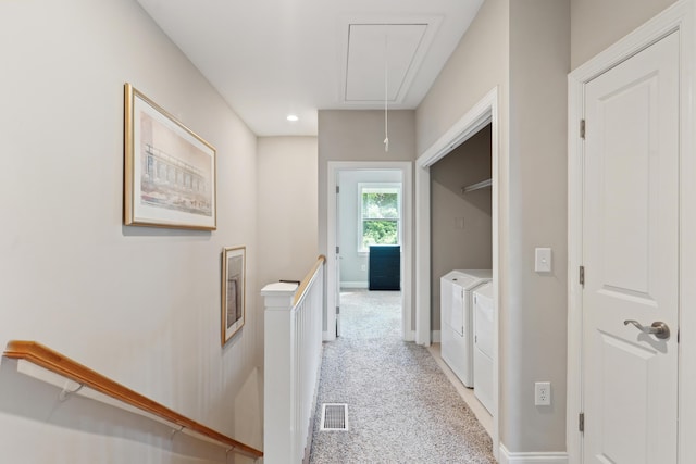 5511 Colonial Chatsworth Cir N, Charleston, SC 29418 - corridor with attic access, an upstairs landing, washer and dryer, light colored carpet, and recessed lighting