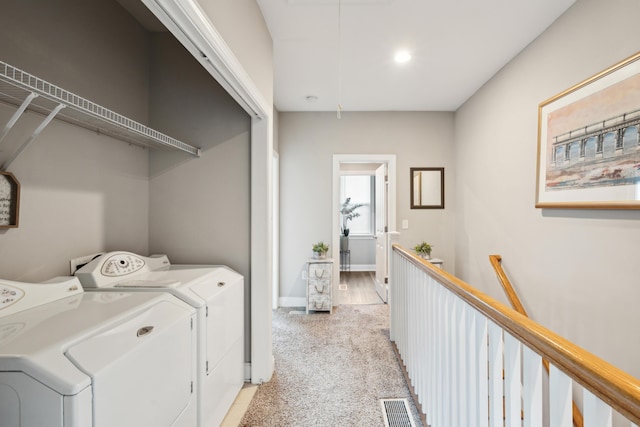 5511 Colonial Chatsworth Cir N, Charleston, SC 29418 - laundry area featuring light colored carpet, washing machine and dryer, and recessed lighting