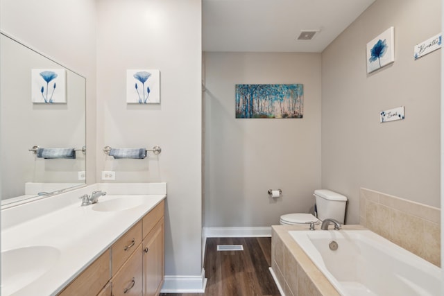 5511 Colonial Chatsworth Cir N, Charleston, SC 29418 - full bath featuring a garden tub, double vanity, and wood finished floors