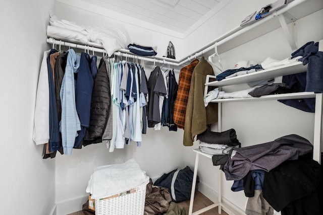 spacious closet with wood finished floors