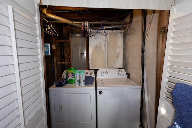 washroom with independent washer and dryer