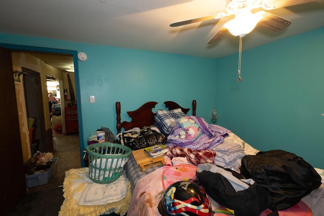 bedroom featuring ceiling fan and carpet floors