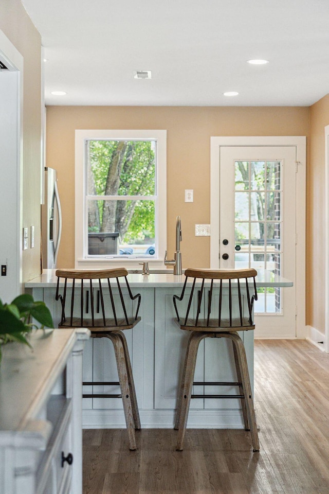 1166 Julian Clark Rd, Charleston, SC 29412 - dining space featuring wood finished floors, healthy amount of natural light, recessed lighting, and baseboards