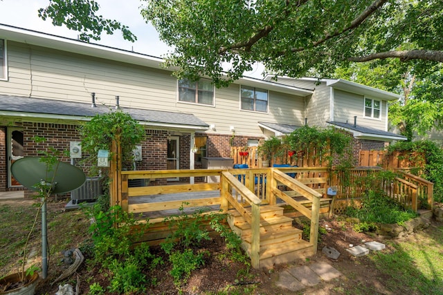 1166 Julian Clark Rd, Charleston, SC 29412 - rear view of house featuring brick siding, a deck, and central air condition unit