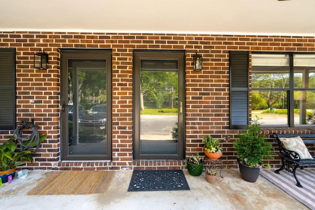 1166 Julian Clark Rd, Charleston, SC 29412 - property entrance with brick siding and a porch