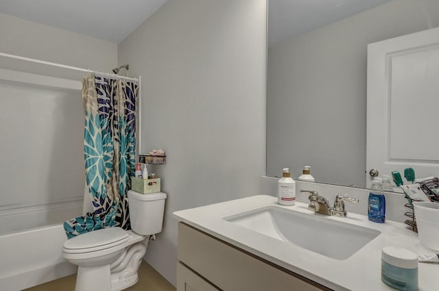 bathroom with toilet, vanity, and shower / bath combo