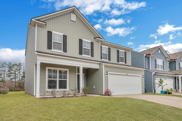 view of front of home with board and batten siding, a front lawn, an attached garage, and concrete driveway