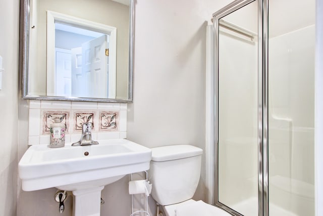 1834 Cornish Ave, Charleston, SC 29412 - full bath featuring a sink, backsplash, a stall shower, and toilet