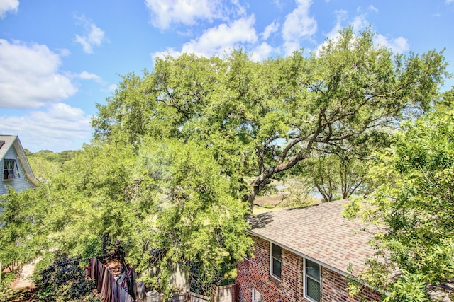 1834 Cornish Ave, Charleston, SC 29412 - exterior space with brick siding, fence, and a shingled roof