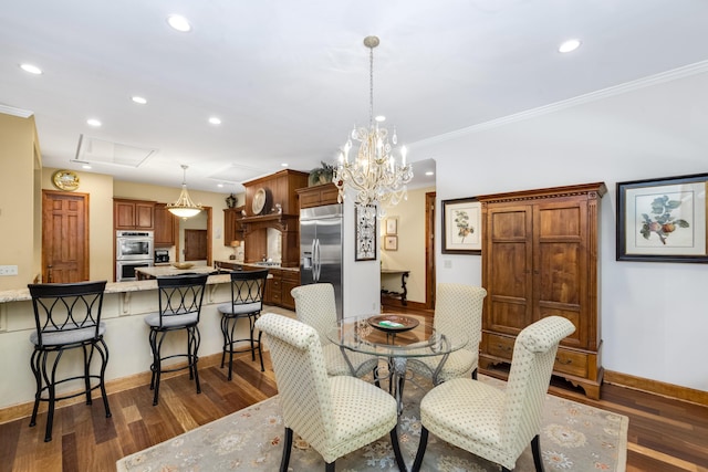 dining area with dark wood-style floors, crown molding, and baseboards