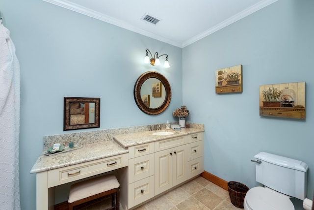 bathroom featuring crown molding, visible vents, toilet, vanity, and baseboards