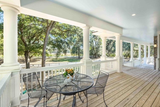 sunroom / solarium with decorative columns