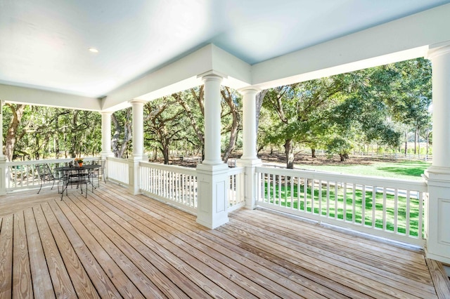 deck with outdoor dining space