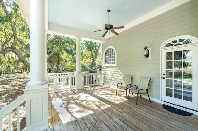 deck featuring a ceiling fan and a porch