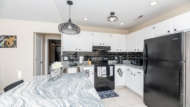 2172 Palermo Pl, North Charleston, SC 29406 - kitchen with black appliances, a sink, decorative backsplash, light stone countertops, and recessed lighting