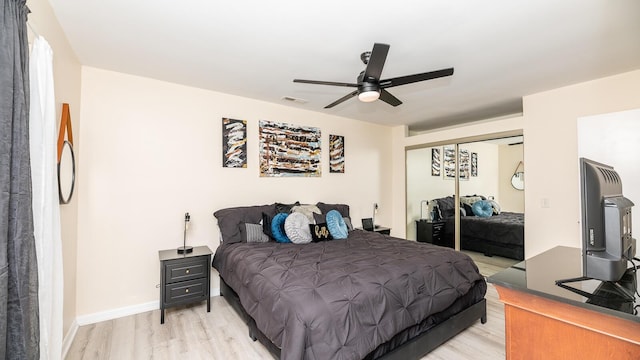 2172 Palermo Pl, North Charleston, SC 29406 - bedroom with light wood-type flooring, a closet, and a ceiling fan