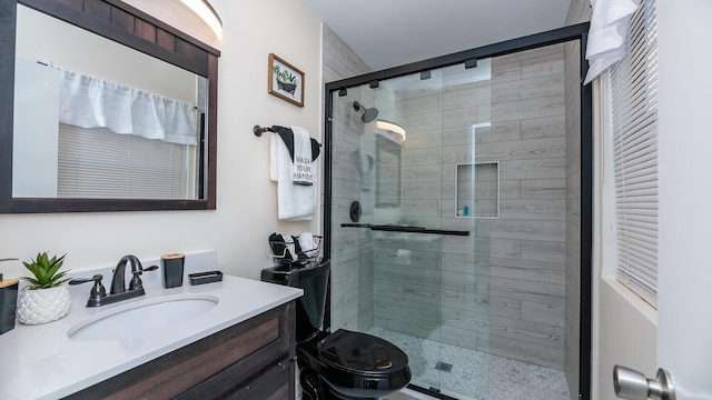 2172 Palermo Pl, North Charleston, SC 29406 - bathroom featuring a shower stall, vanity, and toilet