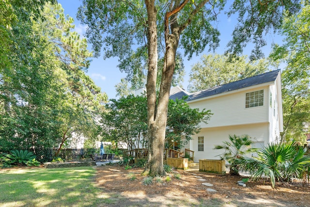 view of yard with a wooden deck