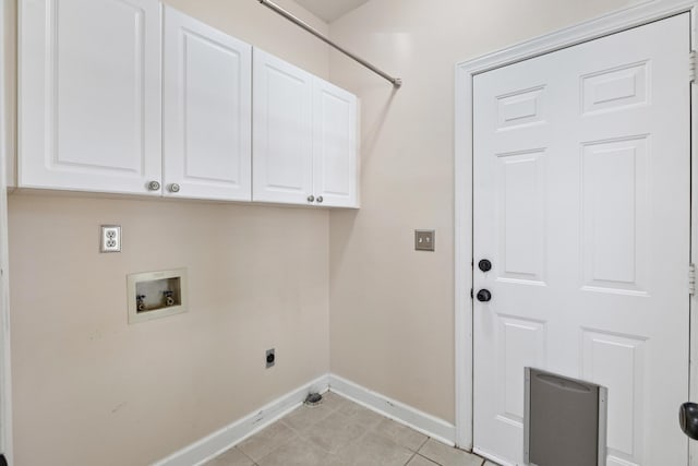 washroom with light tile patterned floors, baseboards, cabinet space, electric dryer hookup, and washer hookup