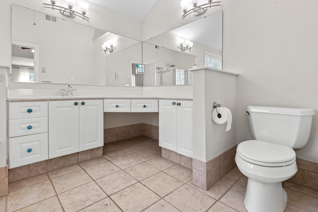 full bathroom featuring visible vents, a notable chandelier, toilet, plenty of natural light, and vanity