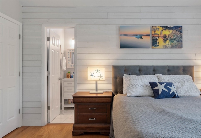 bedroom featuring light wood finished floors