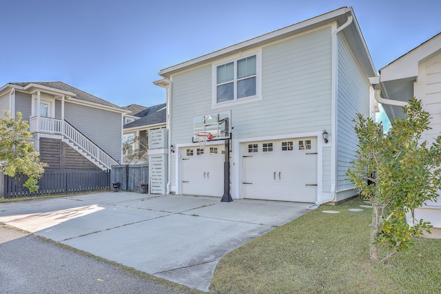 exterior space with a front lawn and a garage