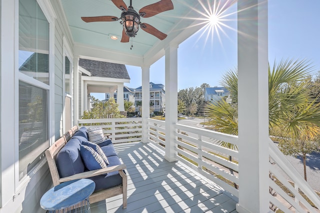 wooden terrace with ceiling fan