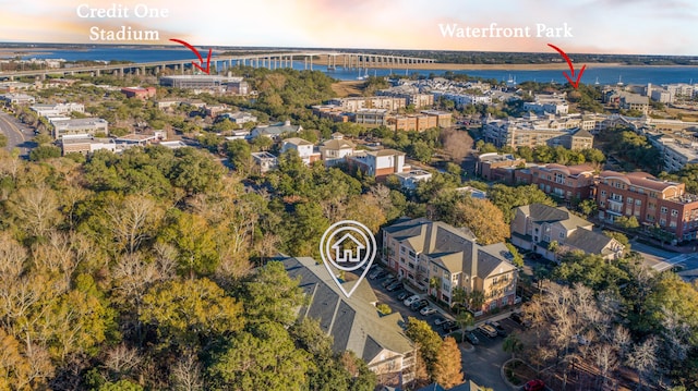 aerial view at dusk with a water view