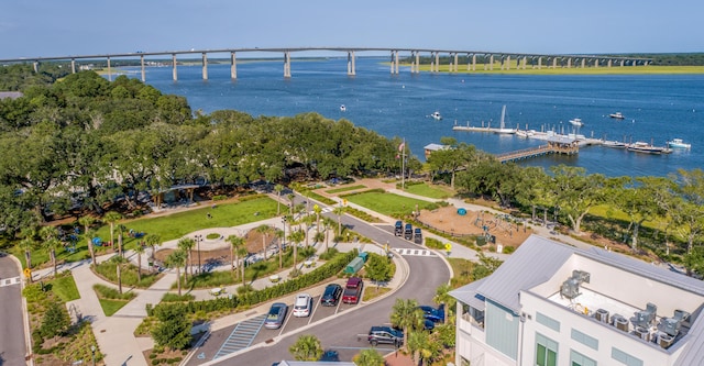 birds eye view of property featuring a water view