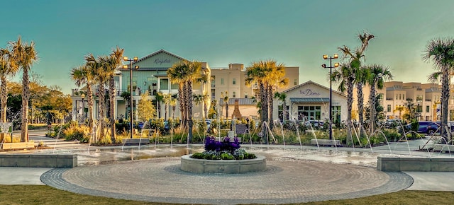 view of outdoor building at dusk