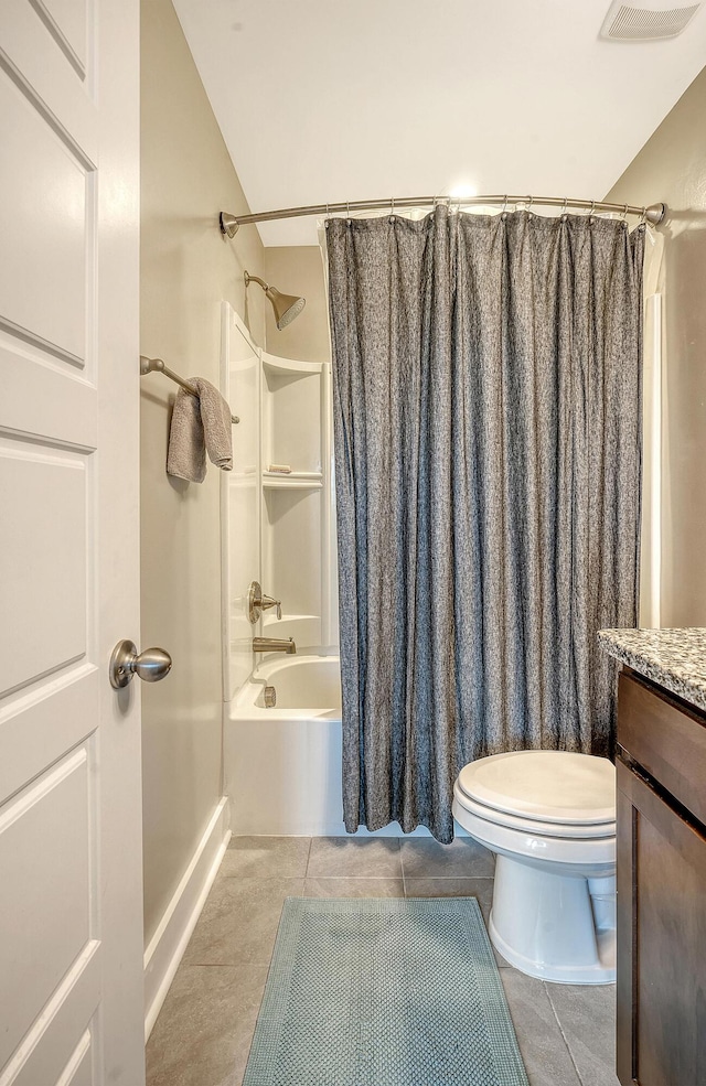 bathroom featuring shower / tub combo with curtain, visible vents, toilet, vanity, and tile patterned flooring