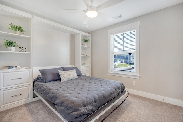 bedroom featuring carpet, visible vents, ceiling fan, and baseboards