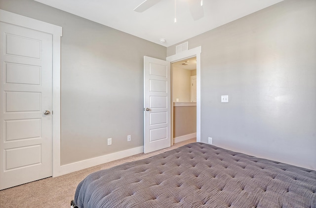 carpeted bedroom featuring visible vents, ceiling fan, and baseboards