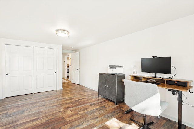 home office featuring dark wood finished floors and baseboards