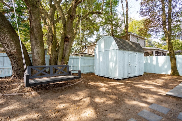 view of shed featuring a fenced backyard