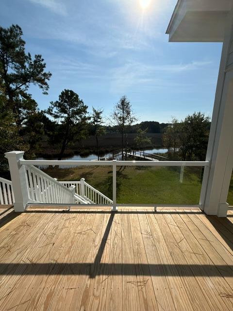 deck featuring a water view