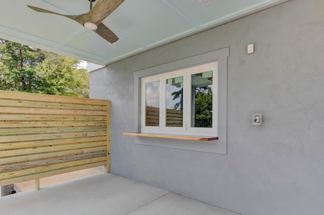 view of patio with ceiling fan