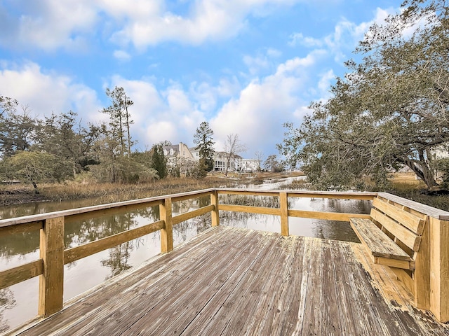 deck featuring a water view