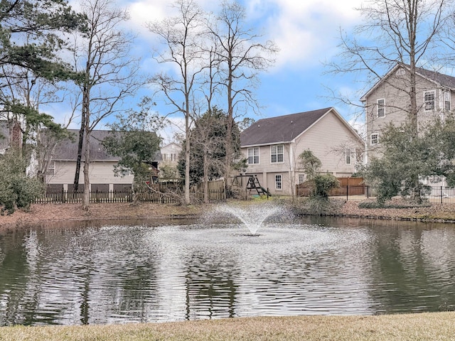 property view of water with fence