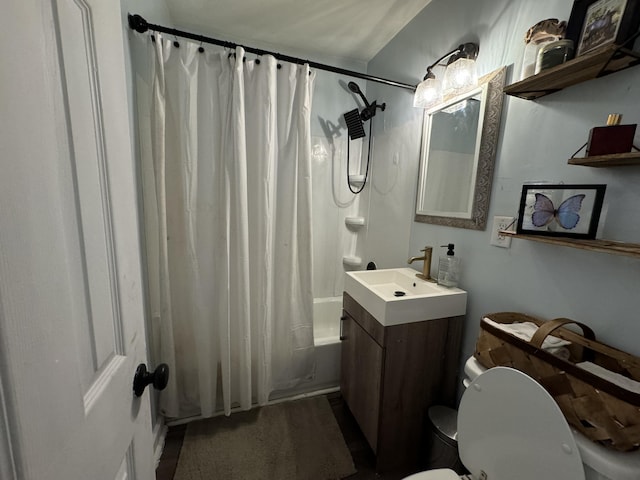 full bathroom with shower / bath combination with curtain, vanity, and toilet