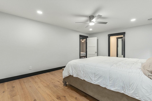 bedroom featuring ceiling fan and light hardwood / wood-style flooring